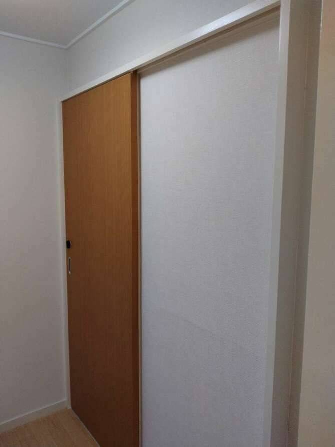 施工後(洗面)アコーディオンカーテン→引き戸